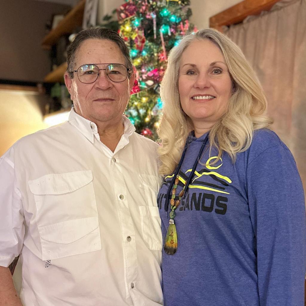 Toby Younis and Shelley Carney enjoy a holiday party together