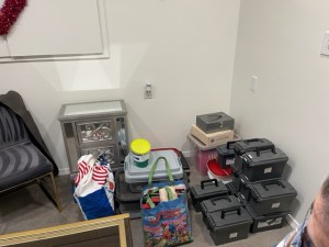 Bags and boxes of coins on the floor