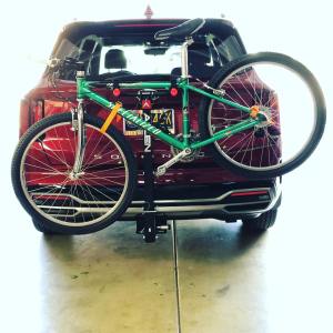 Specialized bicycle strapped to the back of Kia Sorento