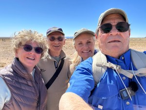 Shelley Carney and Toby Younis along with another older couple at Trinity Site
